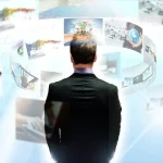 man looking at different aspects of cyber security